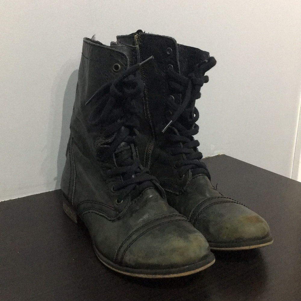 Steve Madden highly distressed boots
